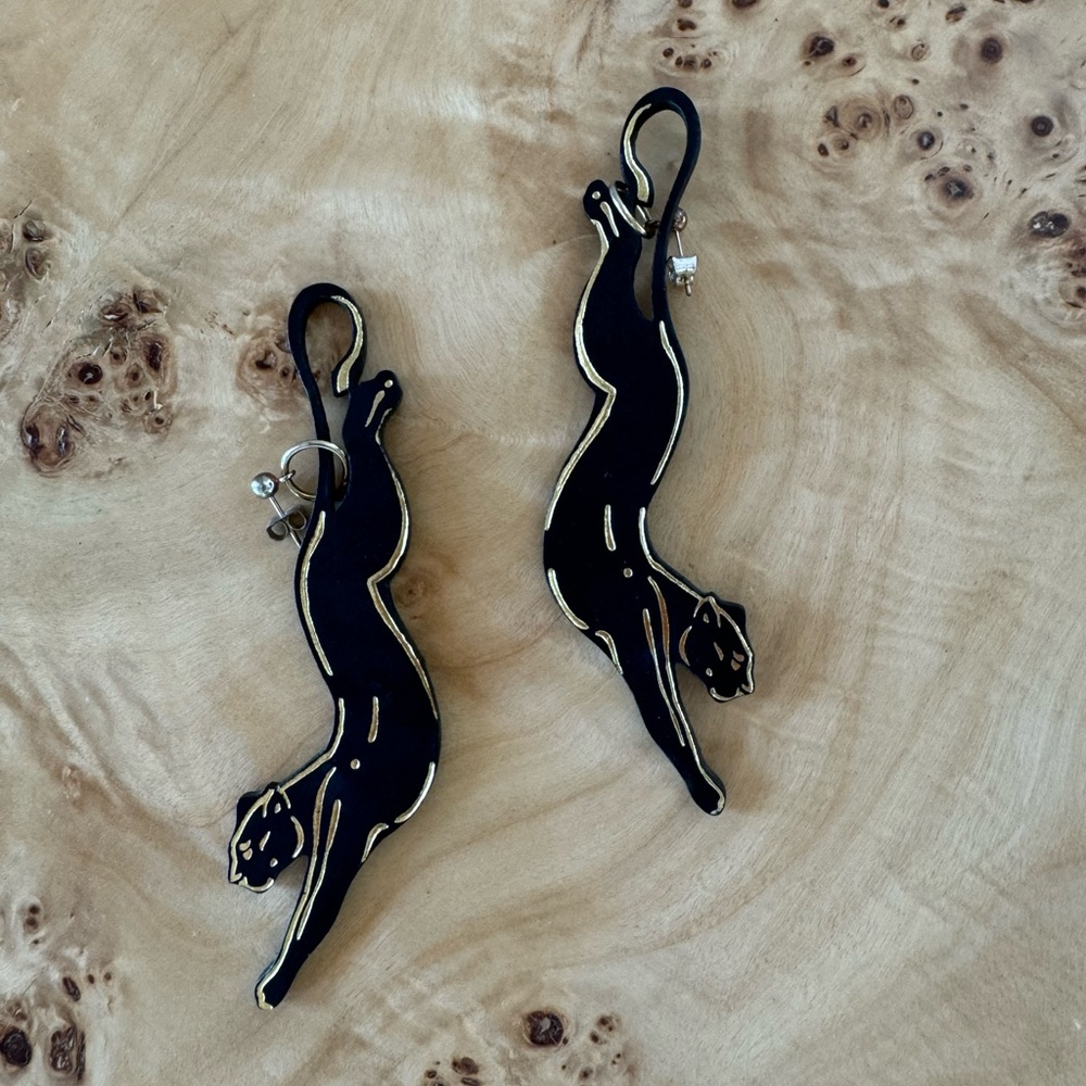 Dangling black panther earrings